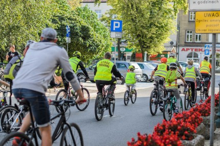 A group of bikers doing a joint tour through the town of Skawina 